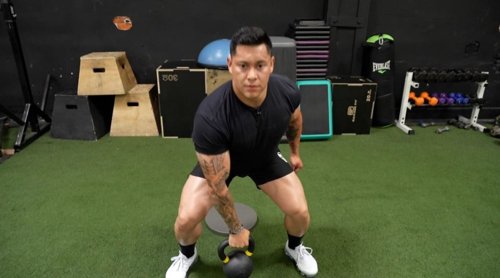 Kettlebell Figure 8 How To Muscles Benefits Mistakes