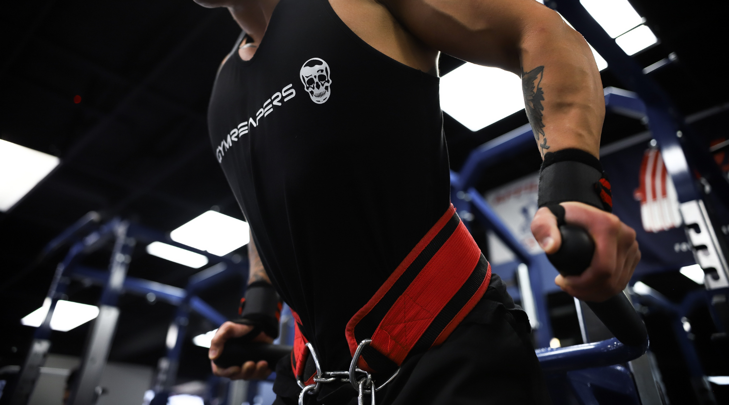 https://www.gymreapers.com/cdn/shop/articles/how_to_use_a_belt_for_dips.png?v=1674664595&width=1500