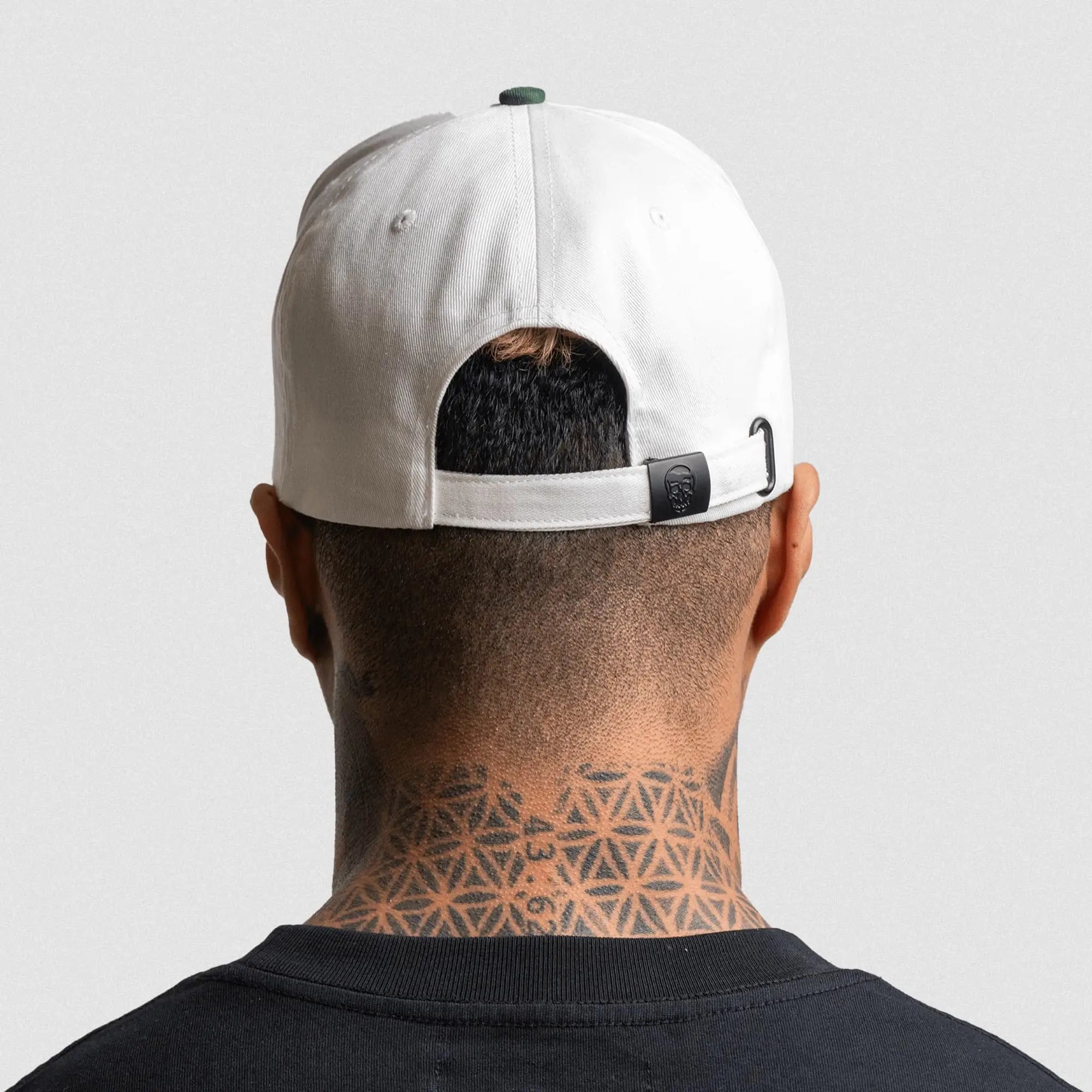 5 panel skull hat white green back view on athlete gray background