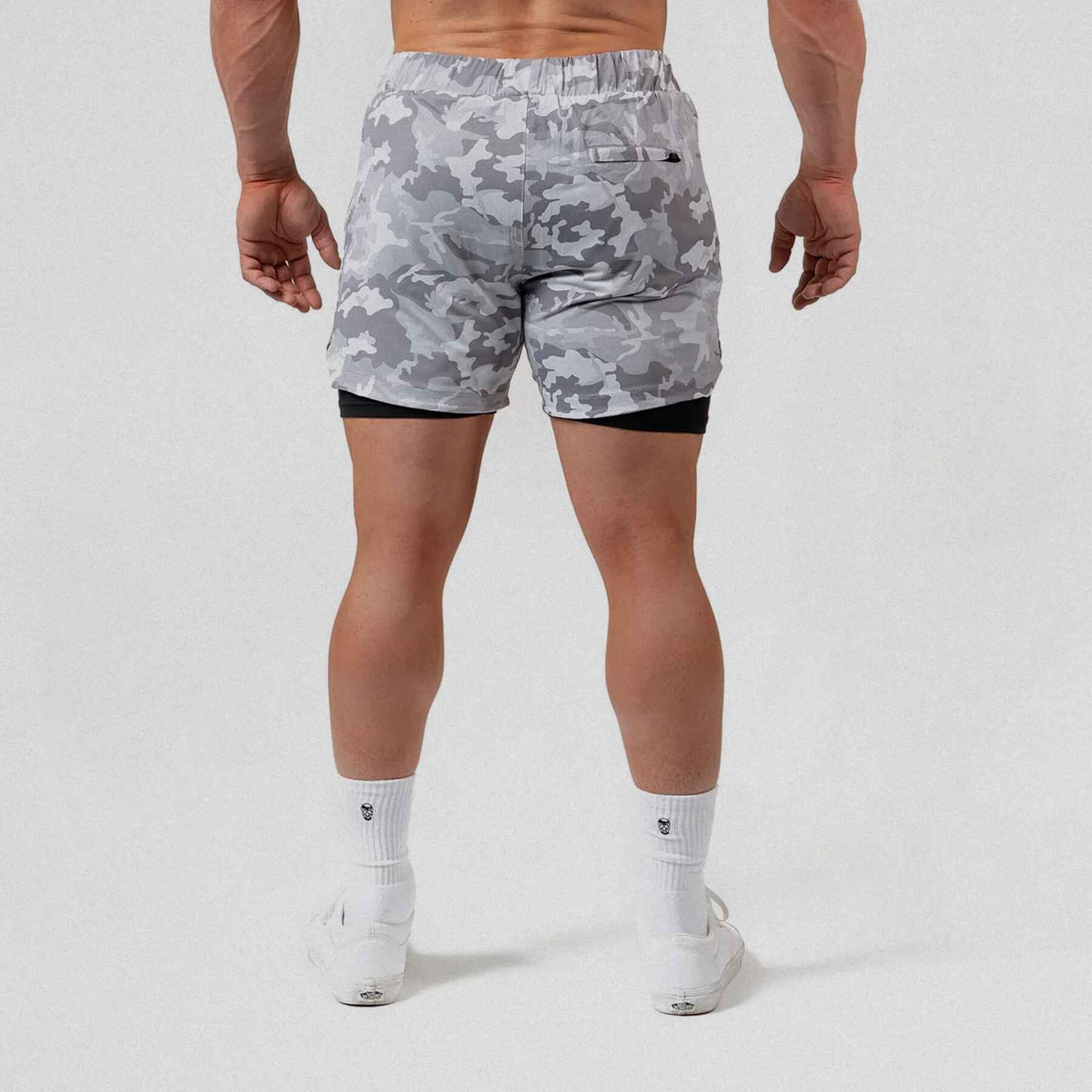 React training shorts white camo color way on athlete showing the back.
