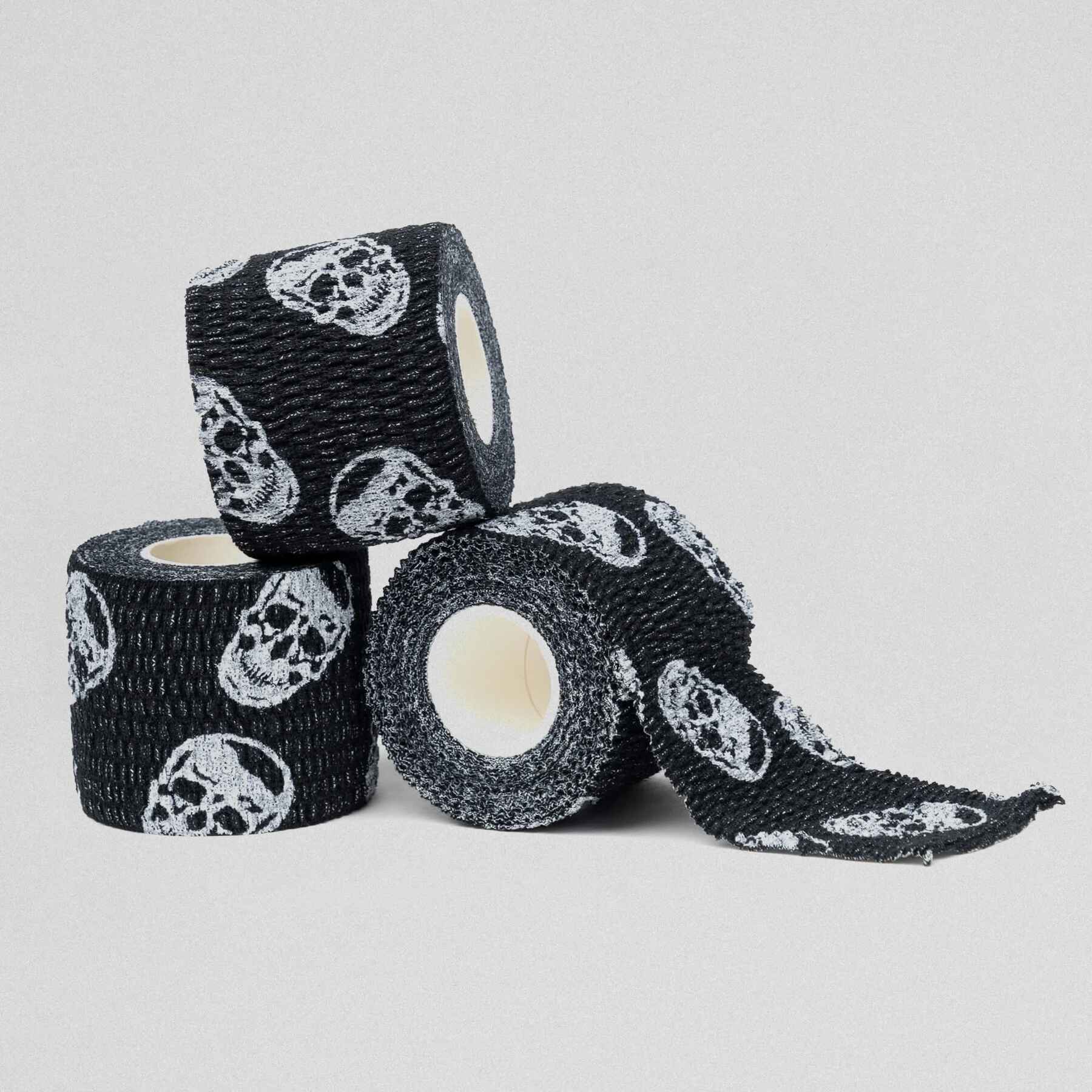 Gymreapers Skull Tape three rolls stacked.