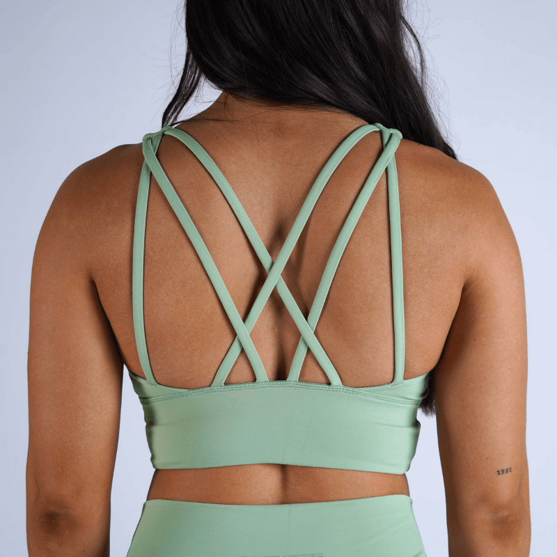 Under Armour crossback mid support bra with mesh panel in mint